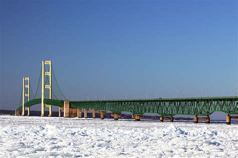 Mackinac bridge in winter Photograph by Alex Nikitsin | Fine Art America