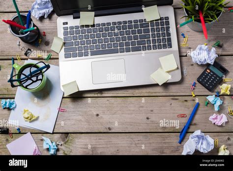 Messy office desk Stock Photo - Alamy