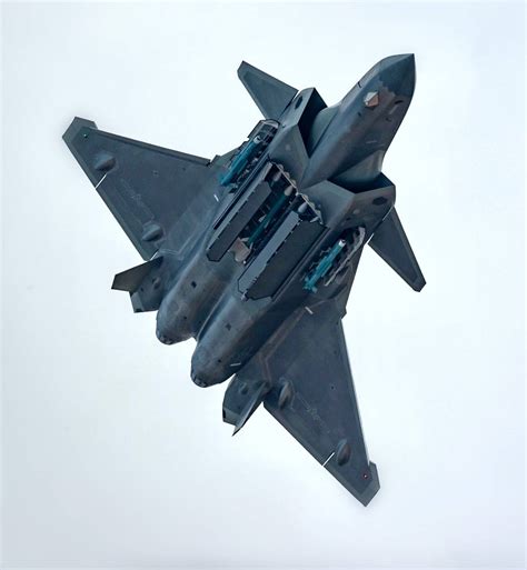 J-20 with weapons bays open and training rounds visible, most likely at ...