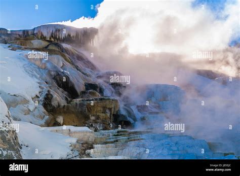 Hot steaming water beautiful cascade geyser - winter landscape in ...