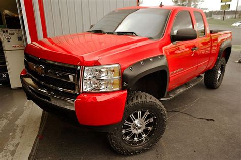 Lifted Red Chevy Truck. | Chevy trucks, Lifted chevy trucks, Chevy