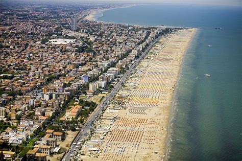 Along the Adriatic Coast - Rimini with miles of beach lounges (With ...