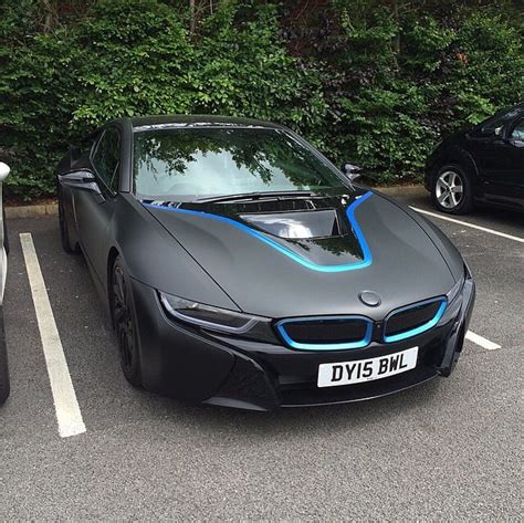 Matte black bmw i8 with blue details - scoopnest.com