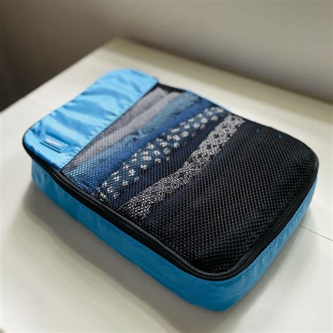 4 Steps to a Neatly Packed Suitcase - Cherishly