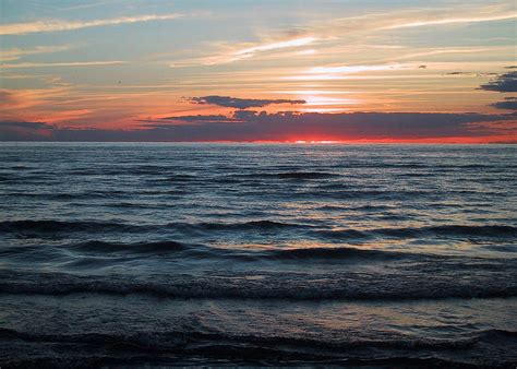 Sauble Beach Sunset by Merv Scoble