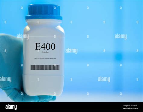 Container of the food additive E400 Stock Photo - Alamy