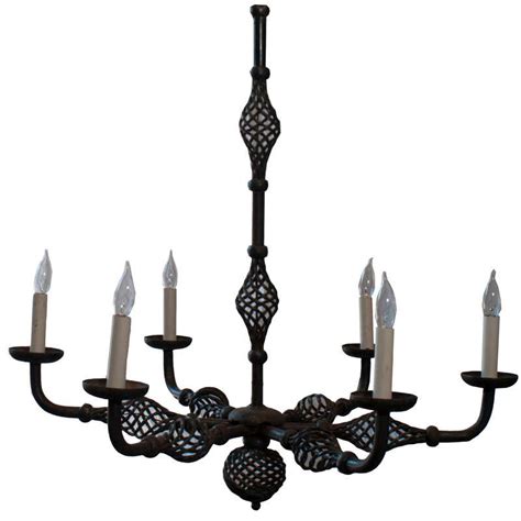 Hand-Forged Wrought Iron, Four-Arm Chandelier at 1stDibs