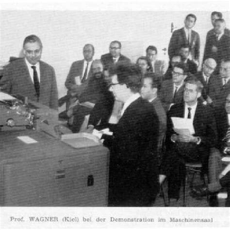 Dr. Gustav Wagner, 3rd from left, demonstrating in 1961 punch card ...