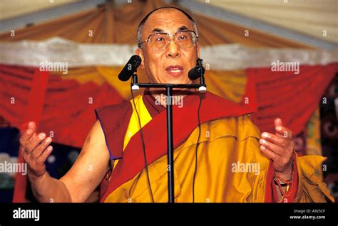 Dalai Lama [aged 72] spiritual leader of Tibetan Buddhism Stock Photo ...