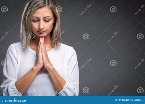 Woman praying to her God stock image. Image of concept - 141022305