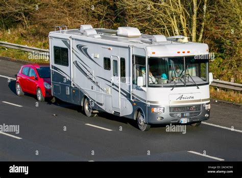 Arista American RV Motorhome towing car; UK Vehicular traffic ...