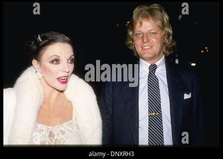 Joan Collins & Peter Holm Stock Photo - Alamy