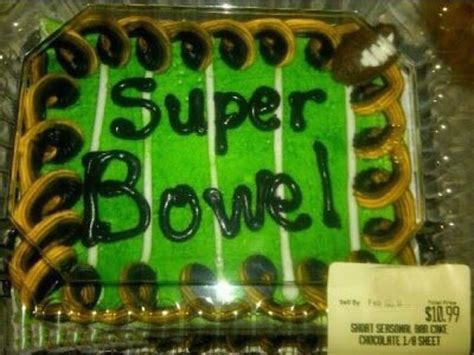 a cake in the shape of a football field with words super bowl written on it