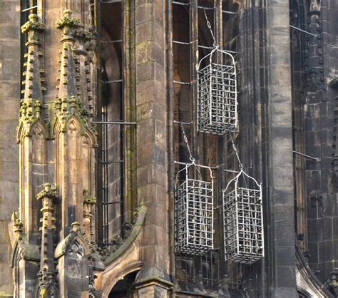 The Hanging Cages of St. Lambert's Church in Münster - photofun 4 u com