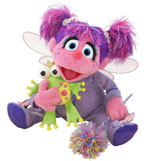 a stuffed animal with purple hair holding a toy