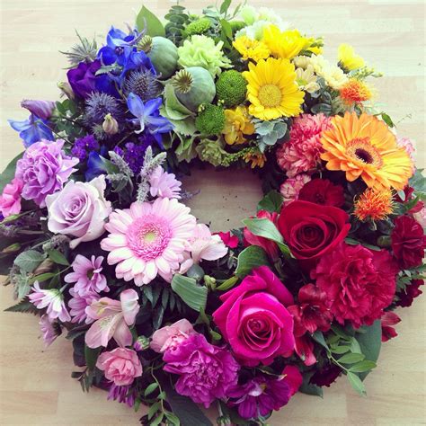 Rainbow wreath | Flower wreath funeral, Rainbow wreath, Funeral floral ...