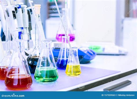 Chemical Analysis, Pharmacology and Laboratory Concept. Flasks with ...