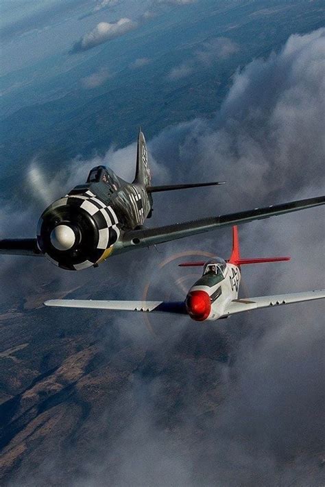 Military Aircraft — Fock Wulf Fw 190 flying ahead of a P-51 Mustang…