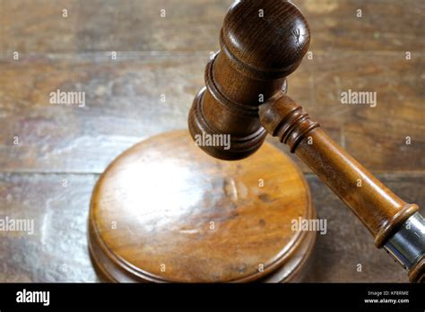 wooden gavel above sound block Stock Photo - Alamy