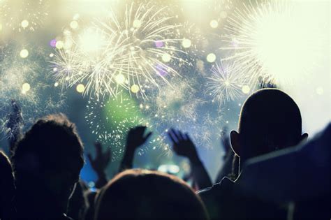 New Year Concept Cheering Crowd And Fireworks Stock Photo - Download ...