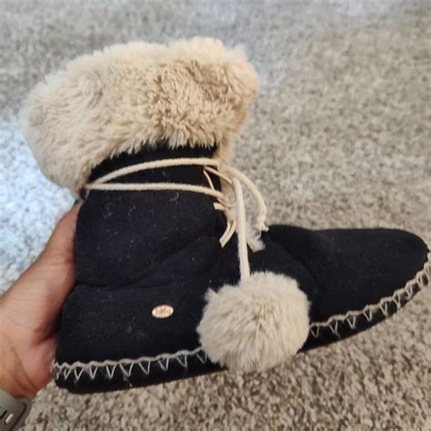 Black and fur trimmed winter boots/uggs Lightly used... - Depop