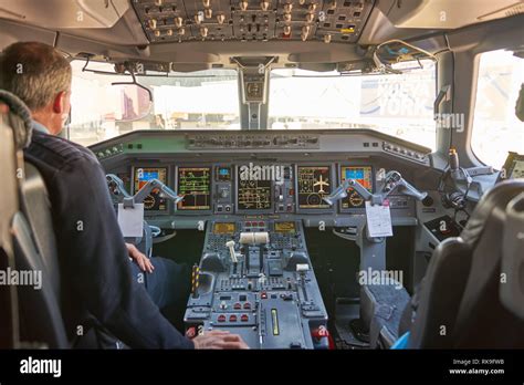 NEW YORK - MARCH 22, 2016: inside of Embraer 190 cockpit. The Embraer E ...