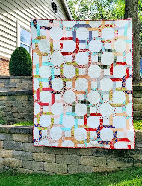 Scrappy Twists and Turns Quilt Pattern – FOUR ROBBINS