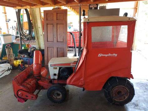 Simplicity lawn tractor with 42-in snow blower and cab - W. Yoder Auction