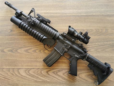 M203 grenade launcher colt marking, barrel mounted on GHK m4a1 gbb ...