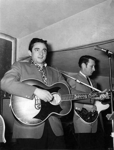 Johnny Cash and Luther Perkins performing on stage June Carter Cash ...