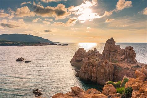 Sunset Over Li Cossi Beach, Sardinia Stock Photo - Image of island ...