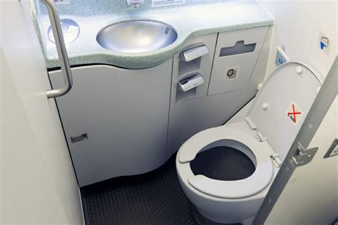 Why You Can't Use the Plane Bathroom Before Takeoff | Reader's Digest