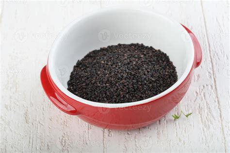 Black sesame seeds 7706273 Stock Photo at Vecteezy