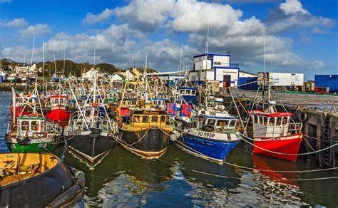 Fishing boats at Greencastle harbour Greencastle, County Donegal, Eire ...