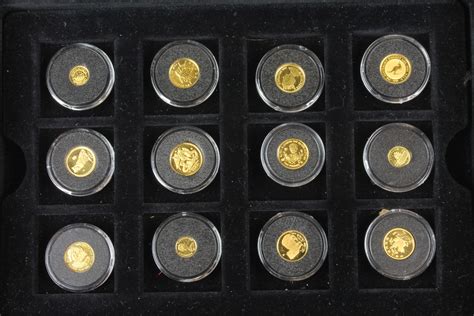 Lot 775, A cased set of 24ct gold "The Smallest Gold Coins of the World ...