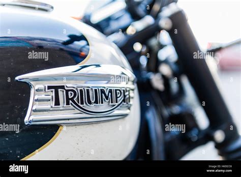 The Triumph logo badge on a Triumph motorbike Stock Photo - Alamy