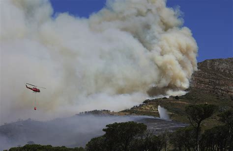 Cape Town fire burns university library, students evacuated | AP News