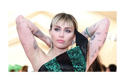 Miley Cyrus Tattoos and Their Hidden Meanings - Explained