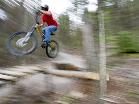 'Mountain Biker Riding Stunts in Whitefish, Montana, USA' Photographic ...