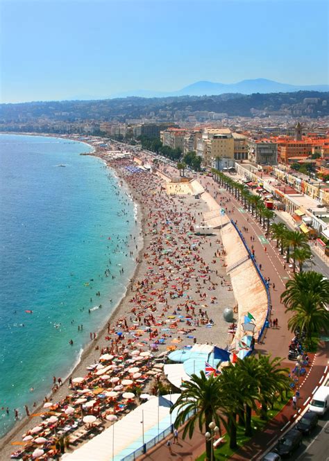 The crowded beach of Nice, French Riviera | TravelTheWorld | Pinterest ...