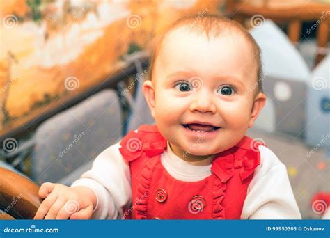 Happy baby smiling stock image. Image of chair, baby - 99950303