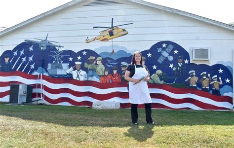 Artist paints military-themed mural on American Legion | Local News ...