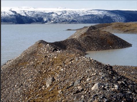 An esker alongside the eastern shore of the glacial lake of Breiðárlón ...