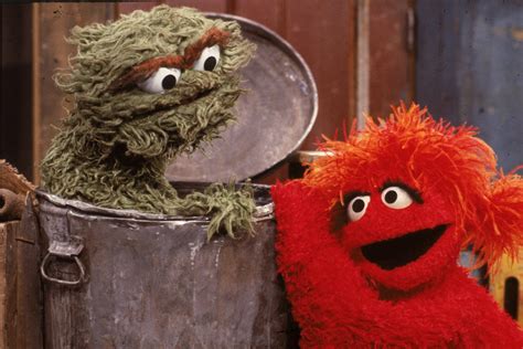 TIL that Oscar The Grouch is actually orange. He only appears green ...