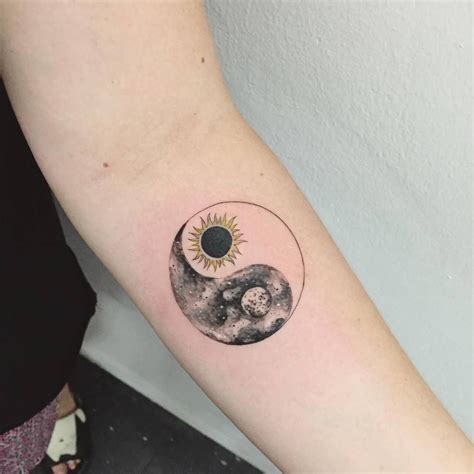 Stunning Sun-Moon Yin Yang Forearm Tattoo