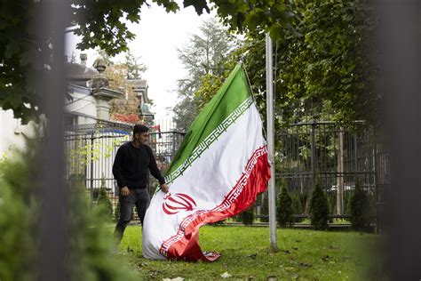 Swiss police violently disperse anti-Iran protest at embassy | AP News