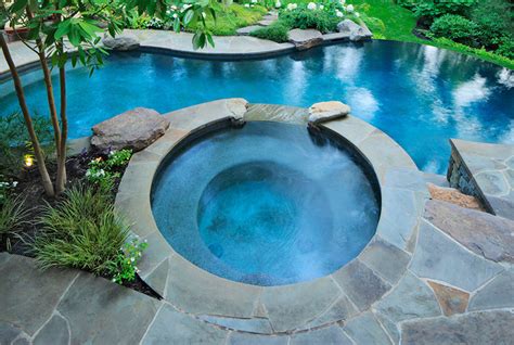 Swimming pool designs with hot tub | Hawk Haven