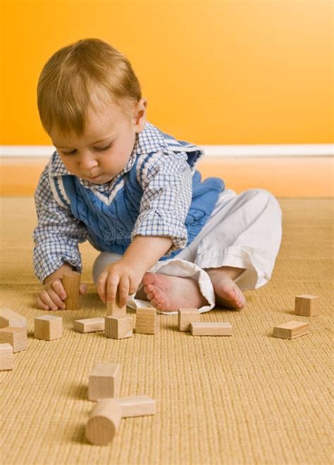 Baby Boy Playing With Blocks Stock Photo - Image of wooden ...