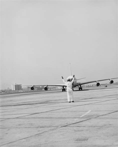 Airport ground crew directing aircraft Free Photo Download | FreeImages