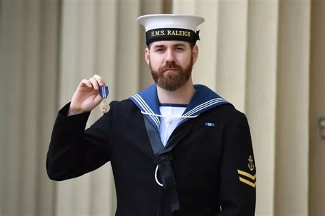 Royal Navy sailor receives Queen's medal after saving 27 lives ...